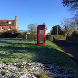 Red telephone box at Stonebridge Green
